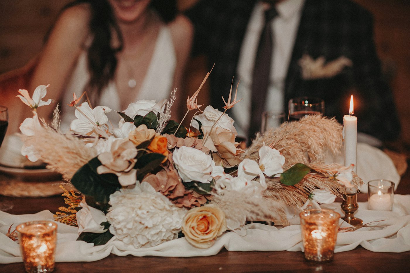 Floral garland running down a reception table